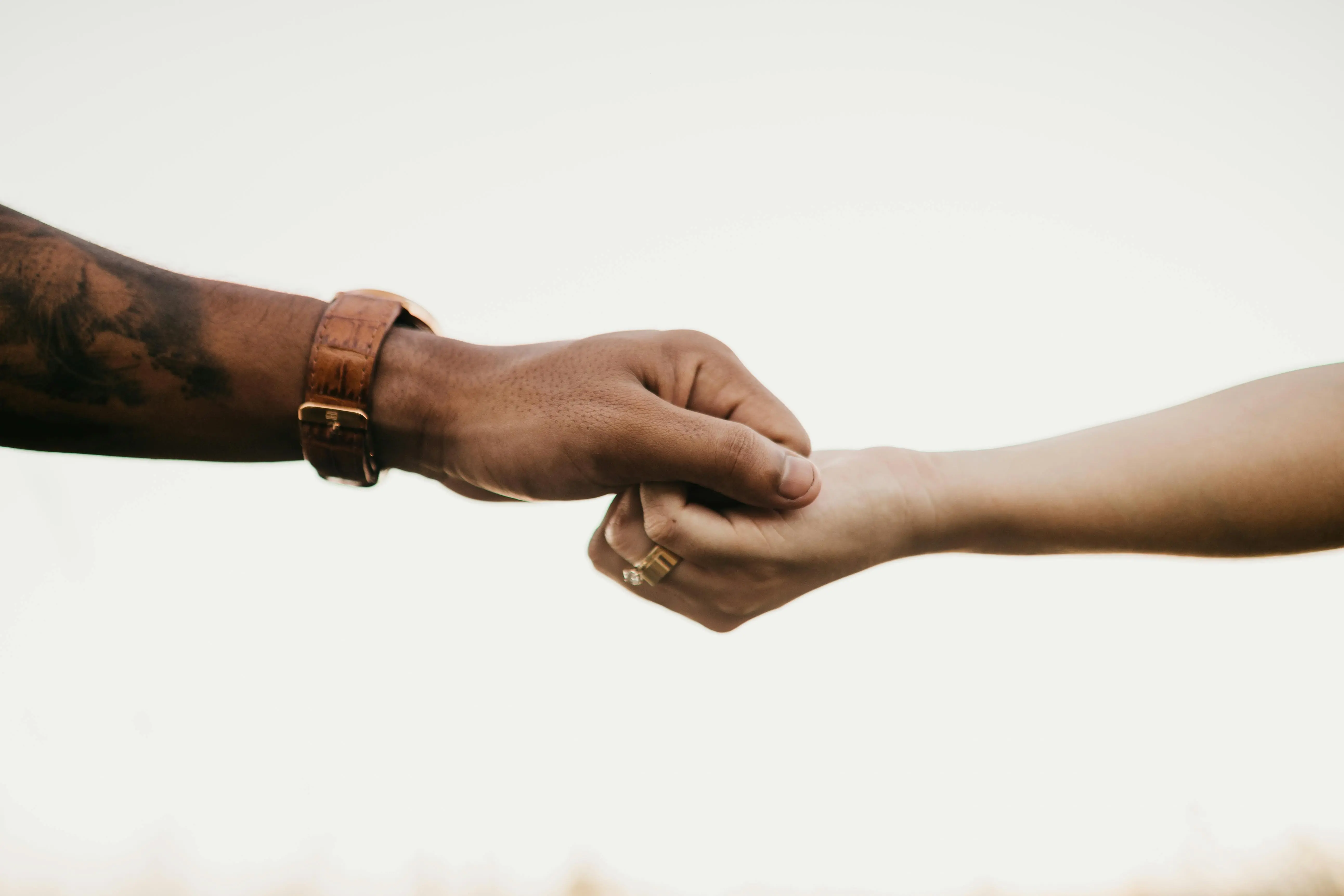 hands grabbing each other